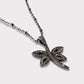 Collar libélula circones plata negra.