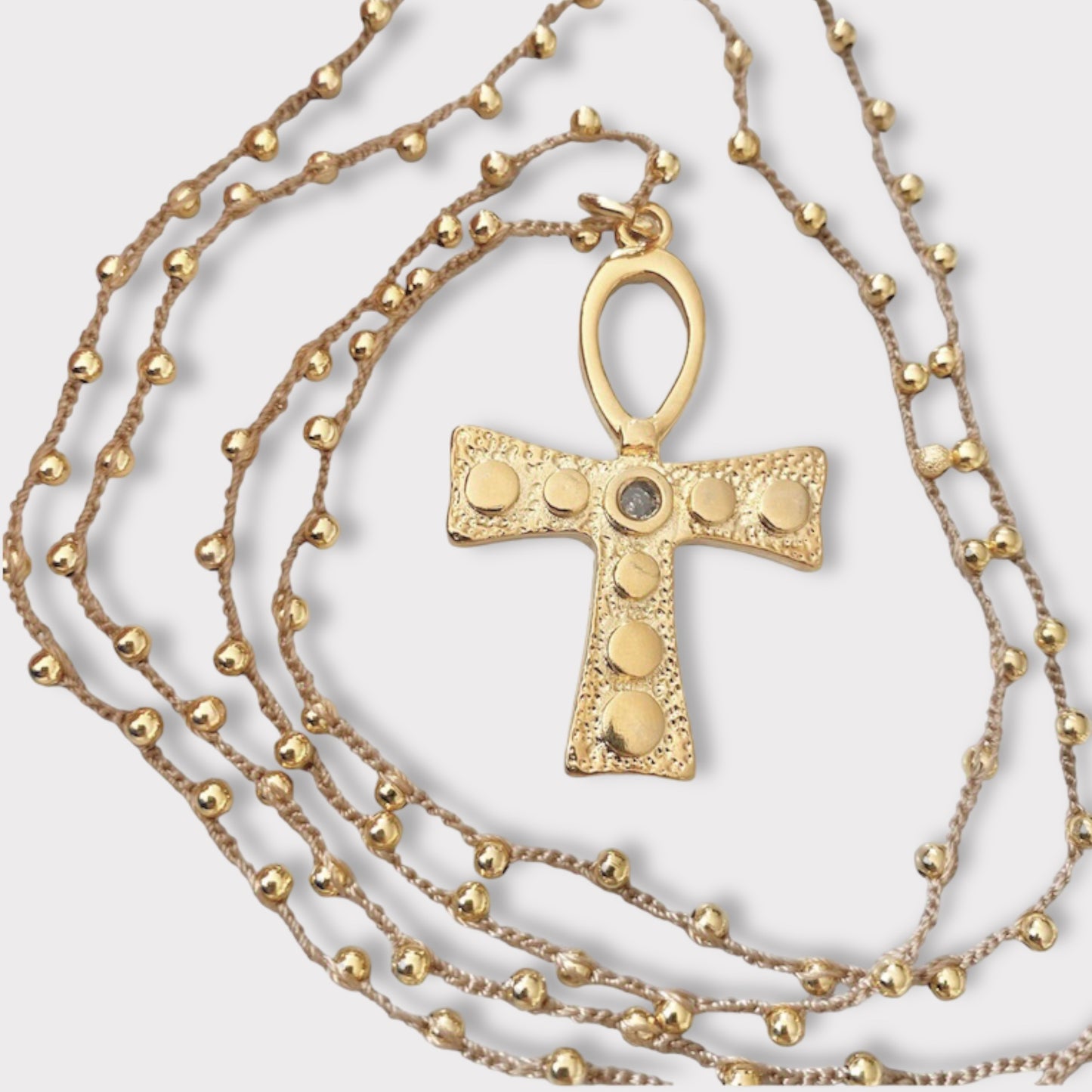 Collar largo tejido cruz egipcia oro