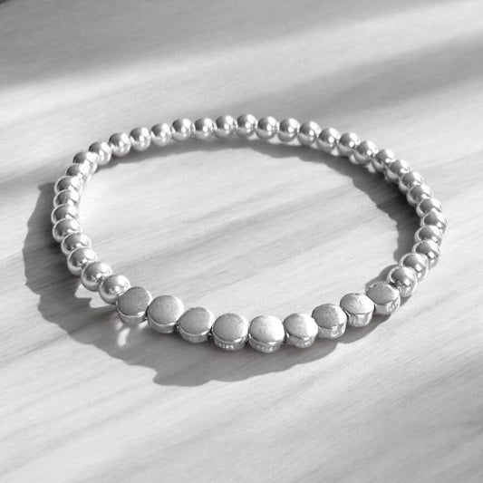 Pulsera bolitas planas plata