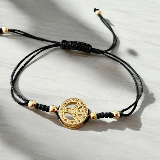Pulsera hilo paz oro