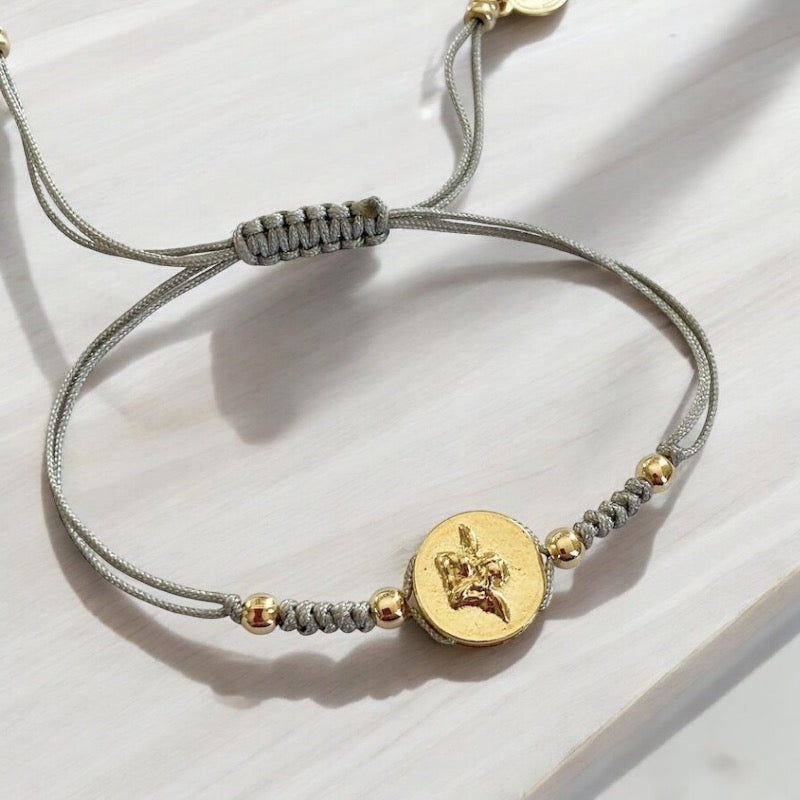 Pulsera hilo ángel de la guarda oro