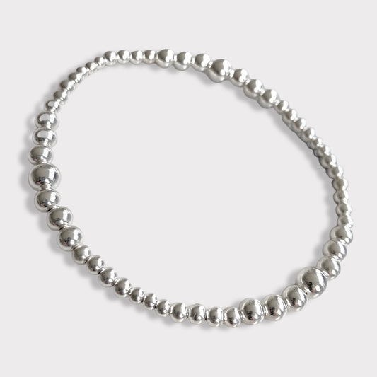 Pulsera bolitas degradé plata