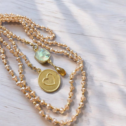 Collar siena cristales champaña corazón oro
