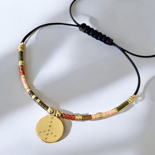 Pulsera hilo mijuki paz oro