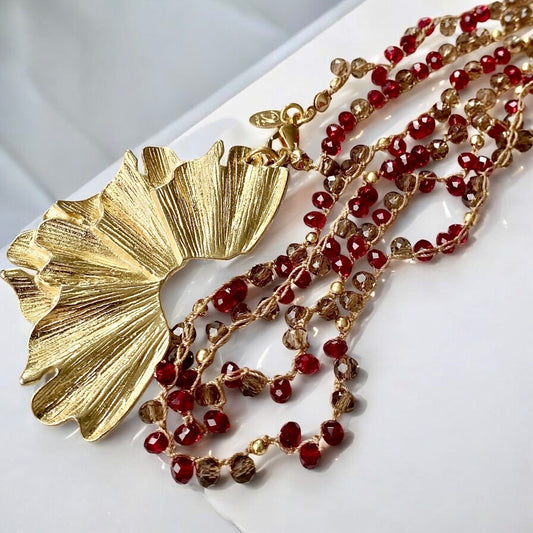 Collar largo tejido flor de mar oro