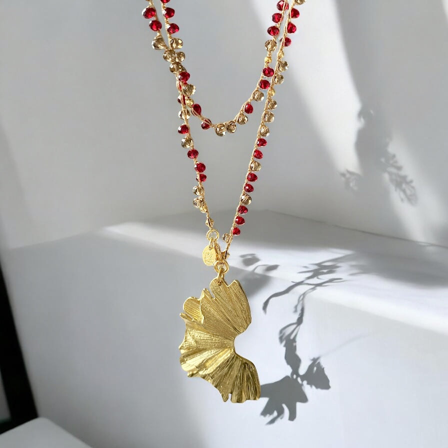 Collar largo tejido flor de mar oro