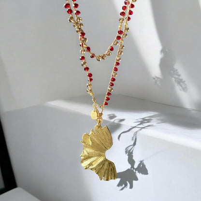 Collar largo tejido flor de mar oro