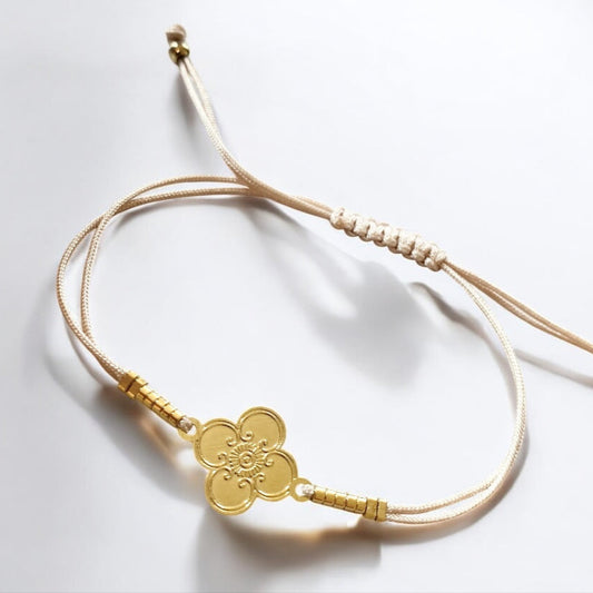 Pulsera hilo flor oro