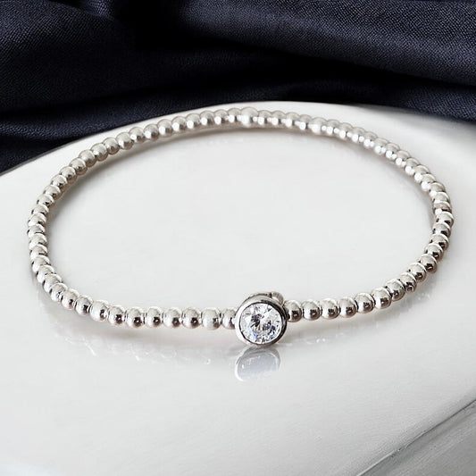 Pulsera bolitas punto de luz plata