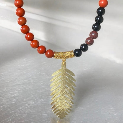 Collar corto tierra oro