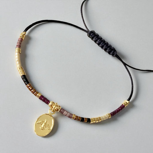 Pulsera hilo mijuki Espíritu Santo oro