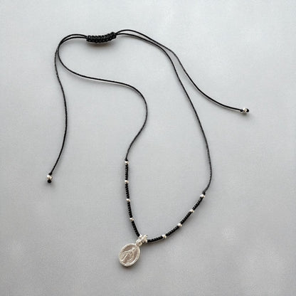 Collar hilo mijuki virgen de los rayos plata