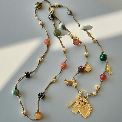 Collar anudado piedras oro