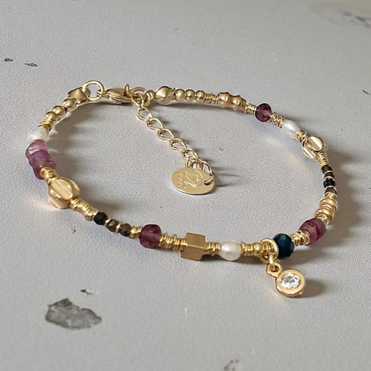 Pulsera piedras  punto de luz oro