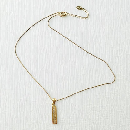 Collar placa circones oro