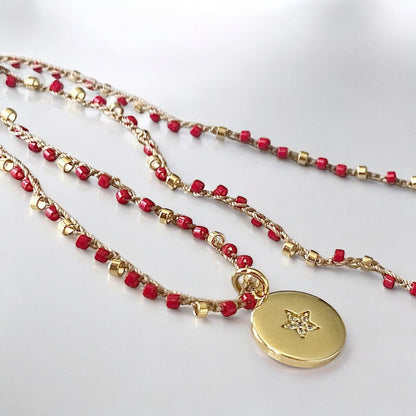 Collar tejido medalla estrella oro