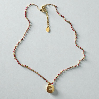 Collar tejido medalla estrella oro