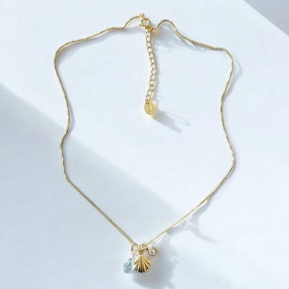 Collar trío mini shell oro