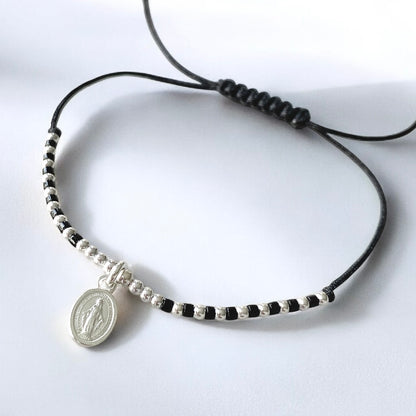 Pulsera hilo mini Virgen de los Rayos plata