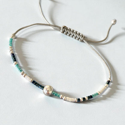 Pulsera hilo mijuki bolita plata