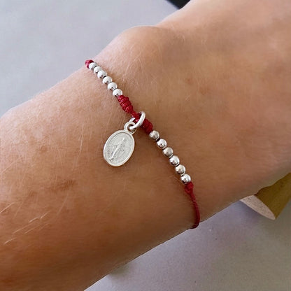 Pulsera hilo rojo Virgen de los Rayos plata