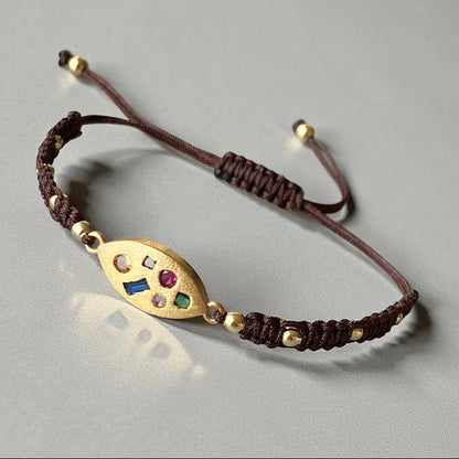 Pulsera macramé plaquita colores oro