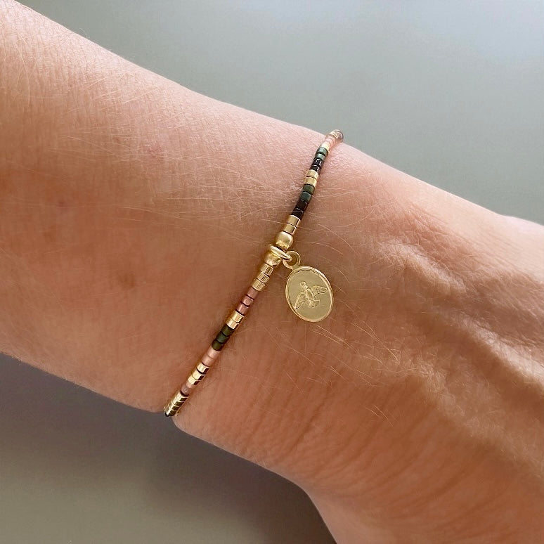 Pulsera hilo mijuki Espíritu Santo oro