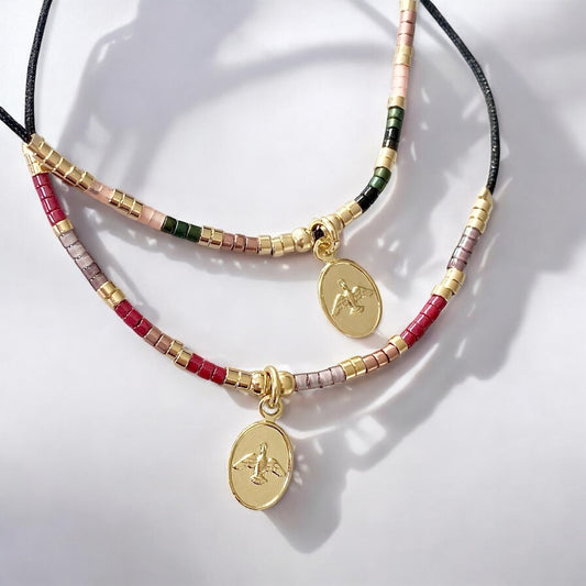 Pulsera hilo mijuki Espíritu Santo oro