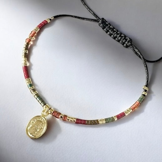 Pulsera hilo mijuki virgen oro