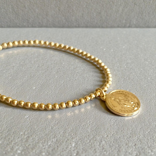 Pulsera bolitas medalla oro