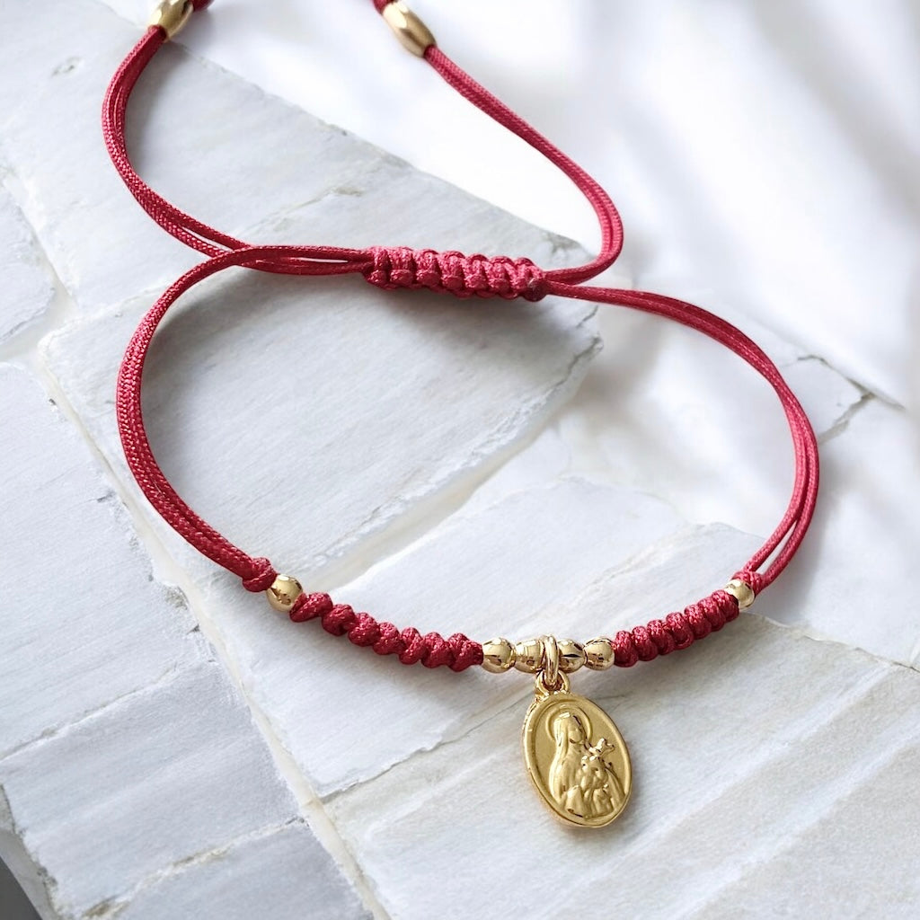 Pulsera hilo rojo Santa Teresita del Niño Jesús oro