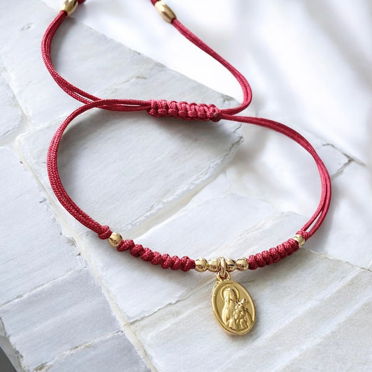 Pulsera hilo rojo Santa Teresita del Niño Jesús oro