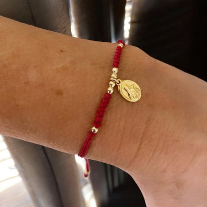 Pulsera hilo rojo Santa Teresita del Niño Jesús oro
