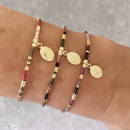 Pulsera hilo mijuki virgen oro