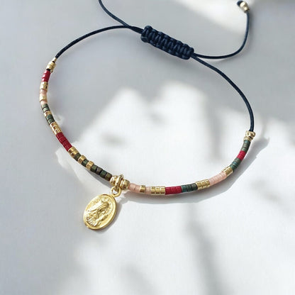 Pulsera hilo mijuki virgen oro