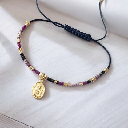 Pulsera hilo mijuki virgen oro