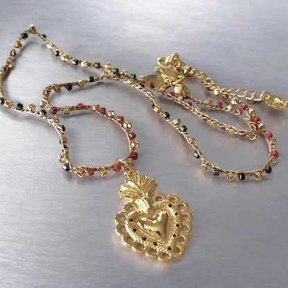 Collar tejido detente oro