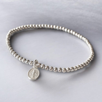 Pulsera mini virgen de los rayos plata