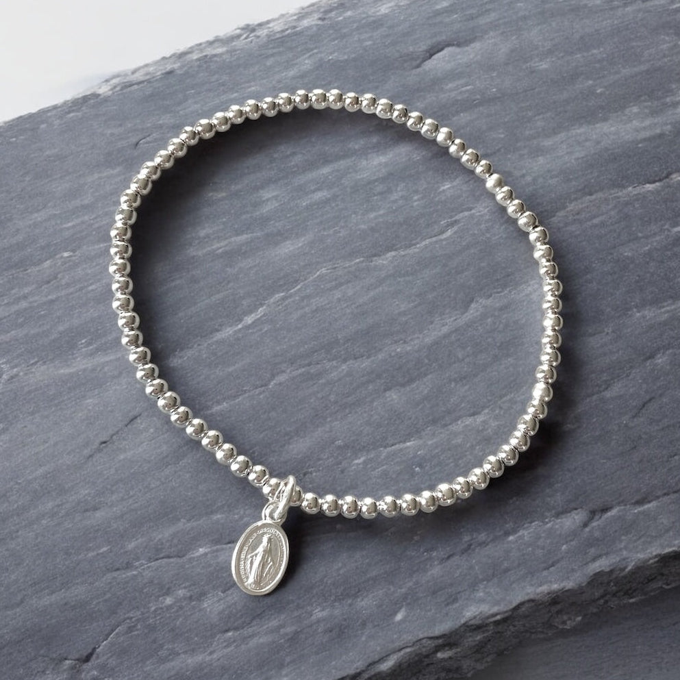 Pulsera mini virgen de los rayos plata