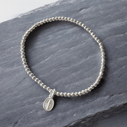 Pulsera mini virgen de los rayos plata