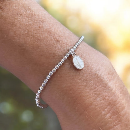 Pulsera mini virgen de los rayos plata