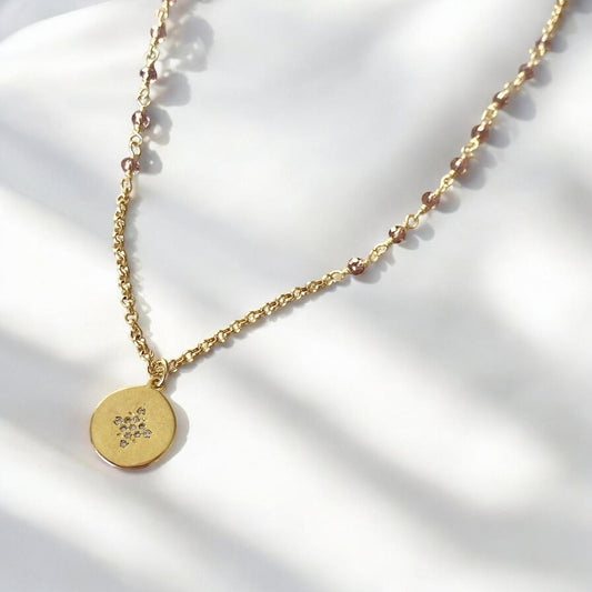 Collar estrella guía oro