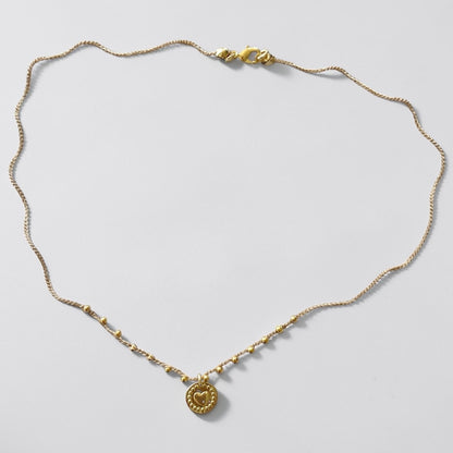 Collar tejido corazón relieve oro
