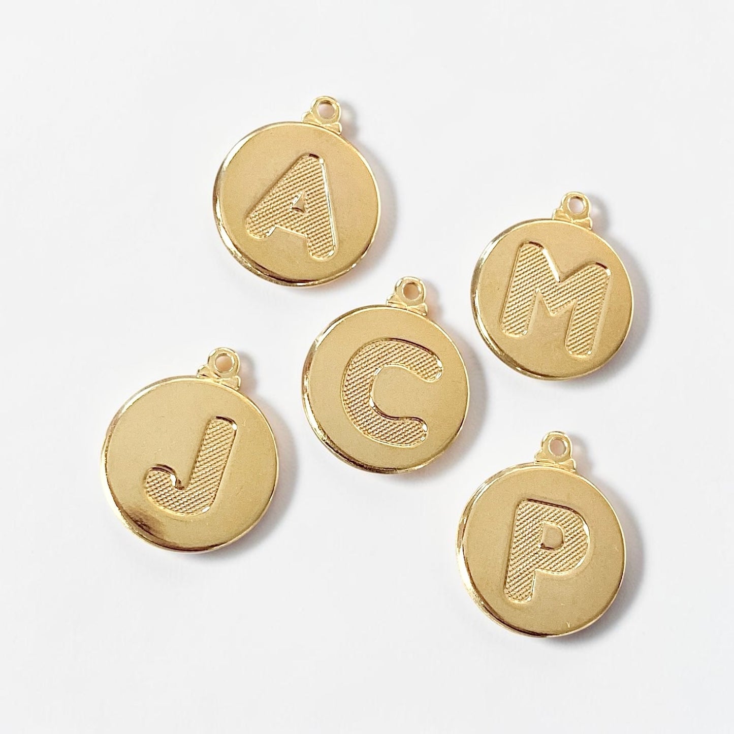 Pulsera medalla letra oro