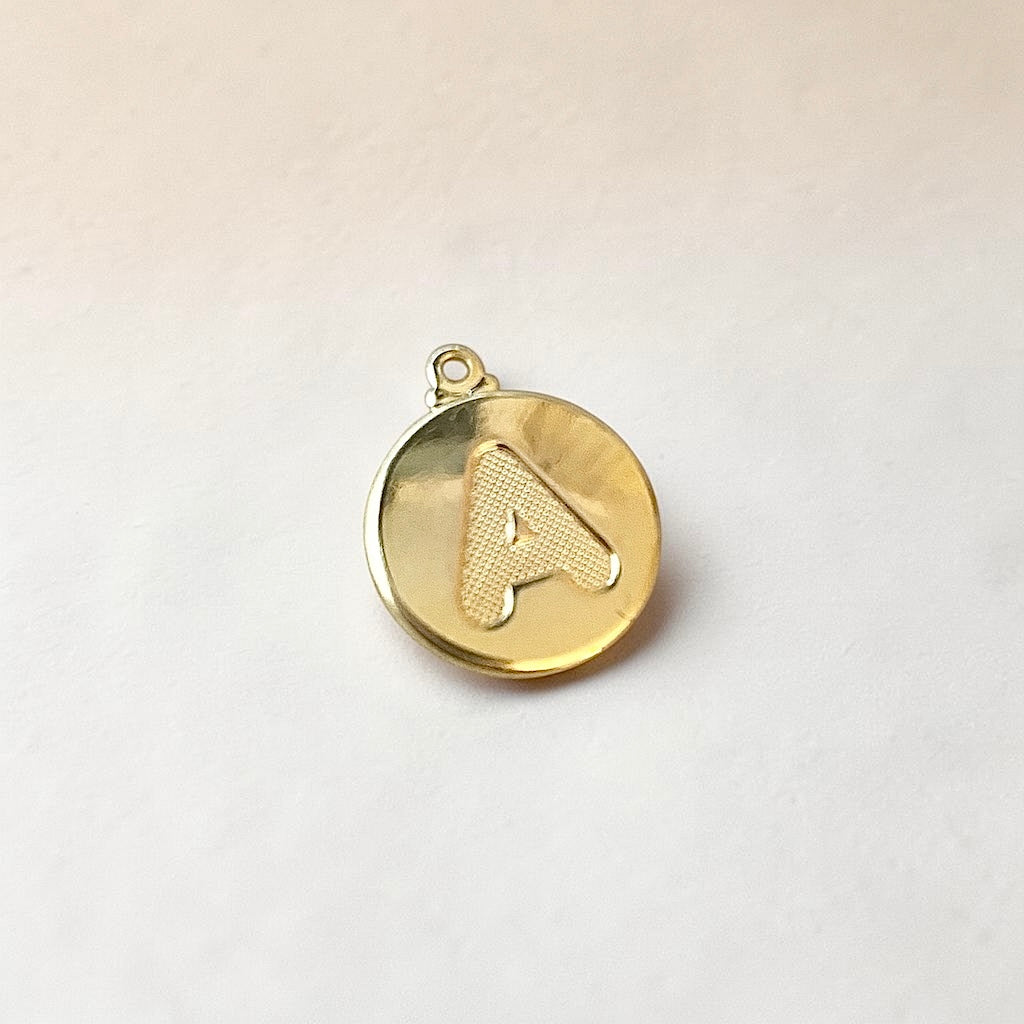 Pulsera medalla letra oro