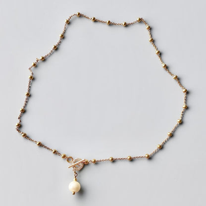 Collar bolitas perla broche oro