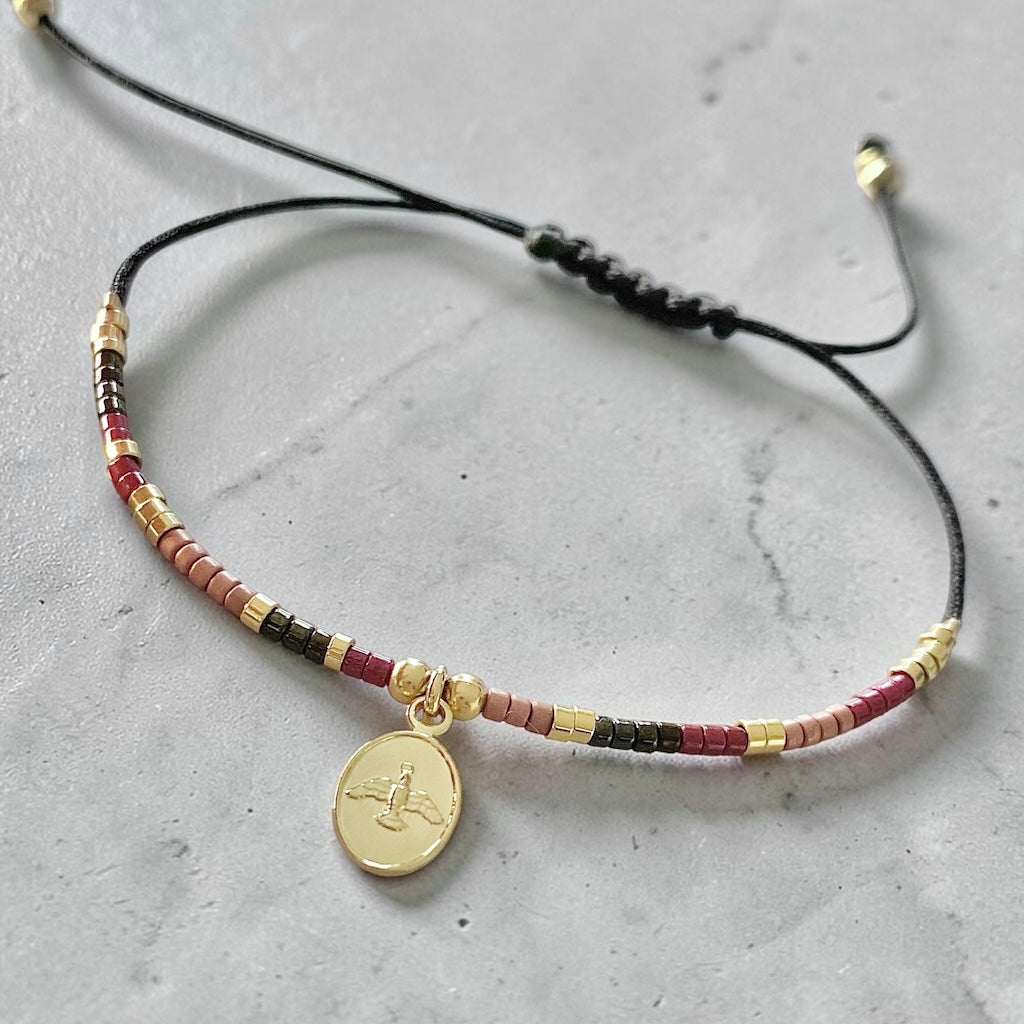 Pulsera hilo mijuki Espíritu Santo oro