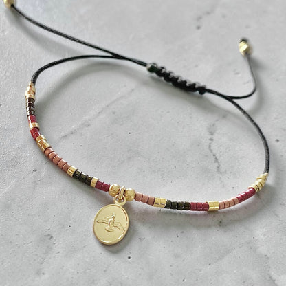 Pulsera hilo mijuki Espíritu Santo oro