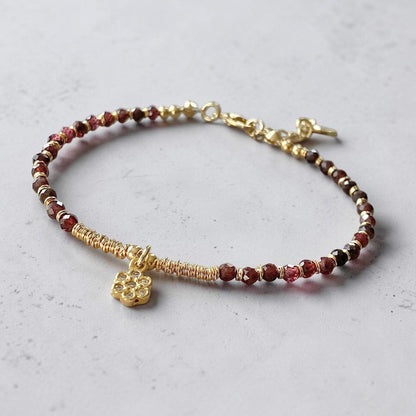 Pulsera margarita granates oro