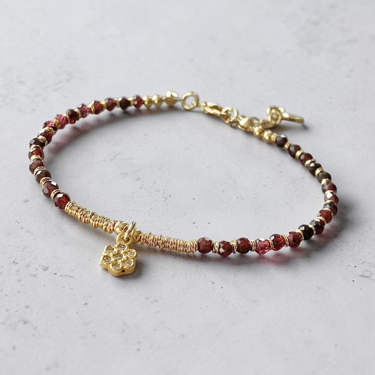 Pulsera margarita granates oro